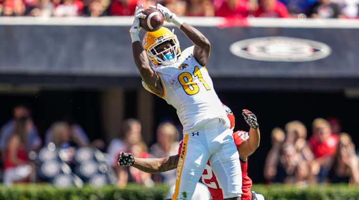 Tez Walker catches a pass while playing for Kent State during the 2022 season